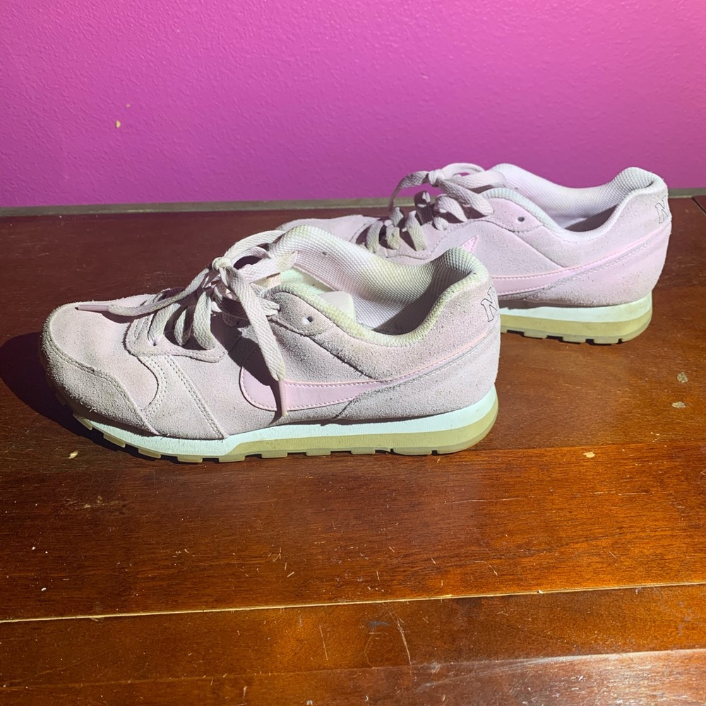Pink suede Nike shoes